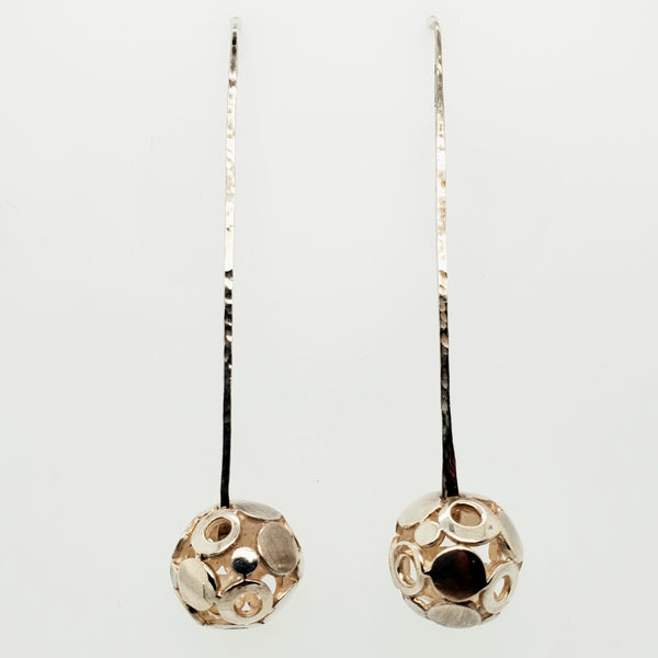 "Boule qui roule" earrings are long (6.5cm) sterling silver studs. The 'boules' forms are 1.5cm in diameter.