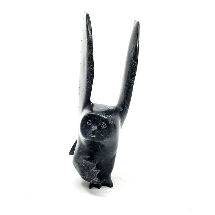 Owl, stone sculpture by artist Parr Parr in Cape Dorset, Nunavut.