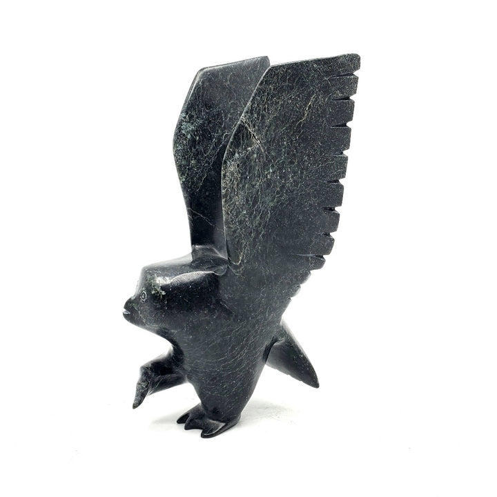 Owl, stone sculpture by artist Parr Parr in Cape Dorset, Nunavut.