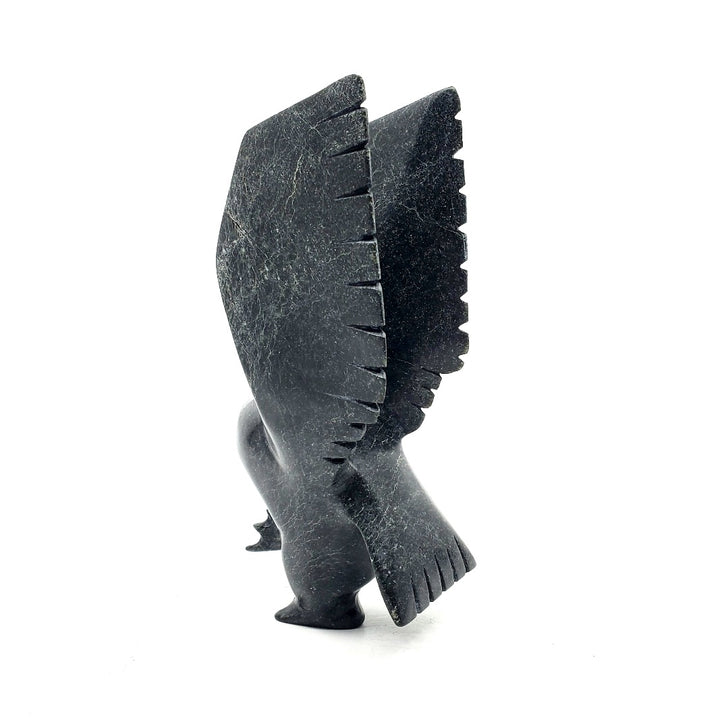 Owl, stone sculpture by artist Parr Parr in Cape Dorset, Nunavut.