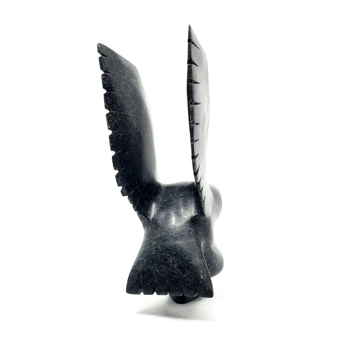 Owl, stone sculpture by artist Parr Parr in Cape Dorset, Nunavut.
