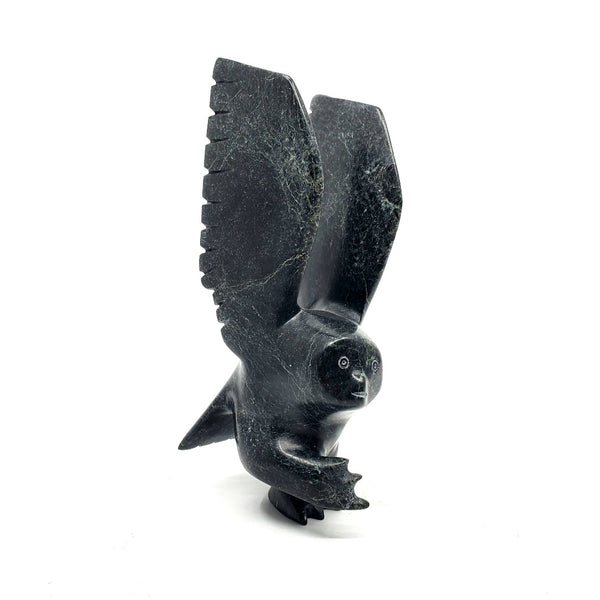 Owl, stone sculpture by artist Parr Parr in Cape Dorset, Nunavut.