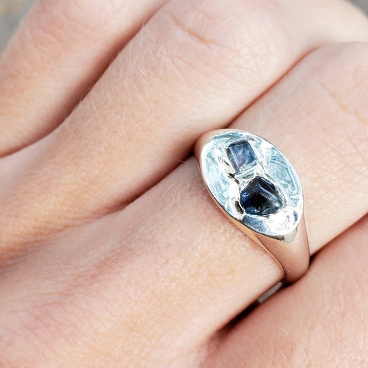 sterling silver signet ring with two light blue rough sapphires