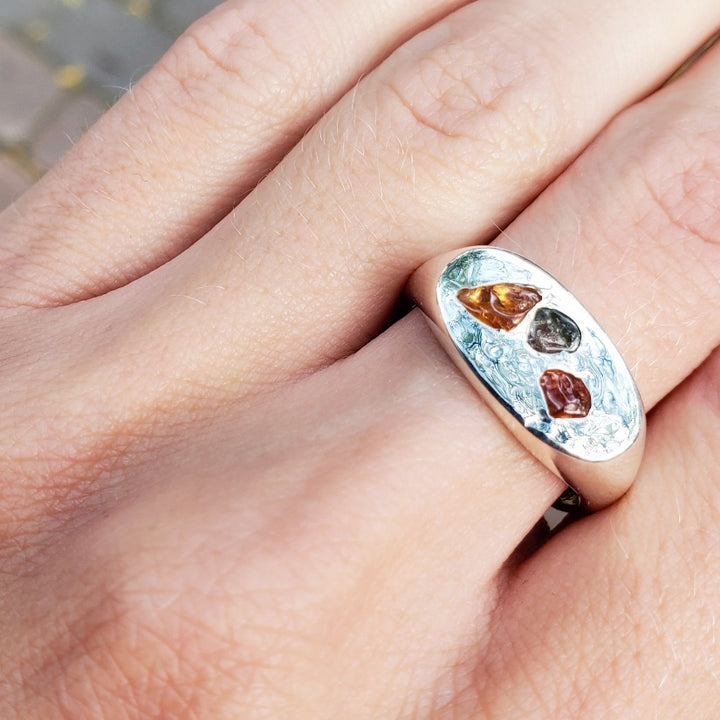 sterling silver signet ring with three rough sapphires in yellow and orange