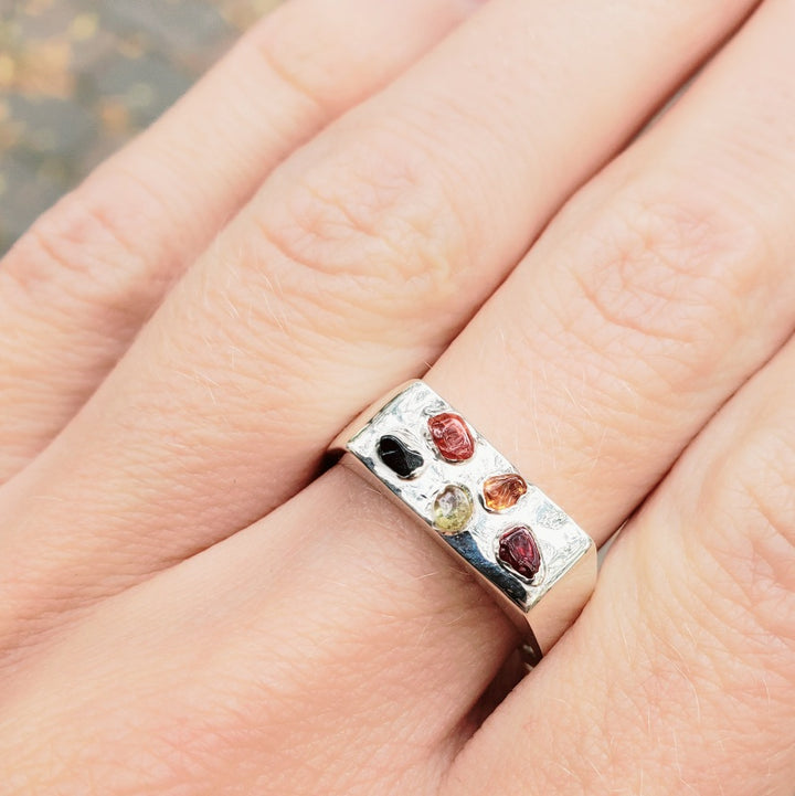 sterling silver signet ring with five rough sapphires in different colours