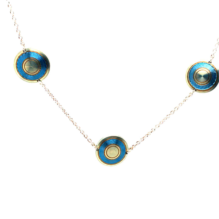 Chroma Titanium Bracelet in a soft play of yellow, gold, and blue