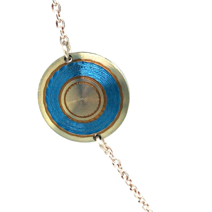 Chroma Titanium Bracelet in a soft play of yellow, gold, and blue