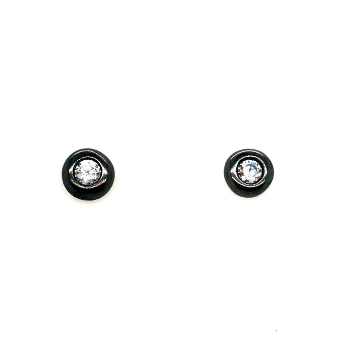 Oxidized sterling silver stud earrings with cubic zirconium stones in size small (7mm), from the Bateau series.