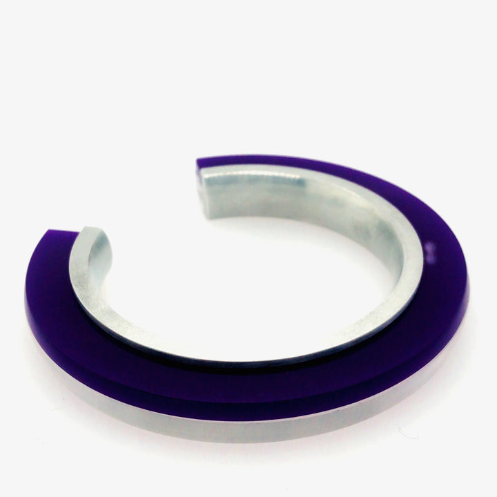 Rotatable purple and clear frosted acrylic bands