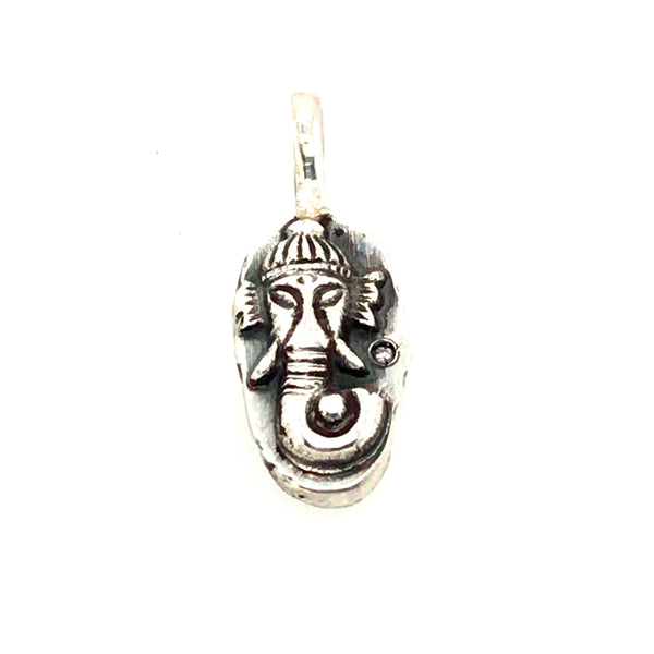 Small Ganesh pendant cast in sterling silver, with a single diamond to the right of the figure