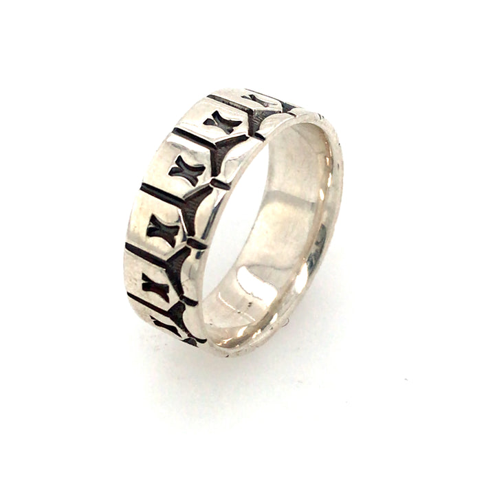 Hand stamped sterling silver ring.