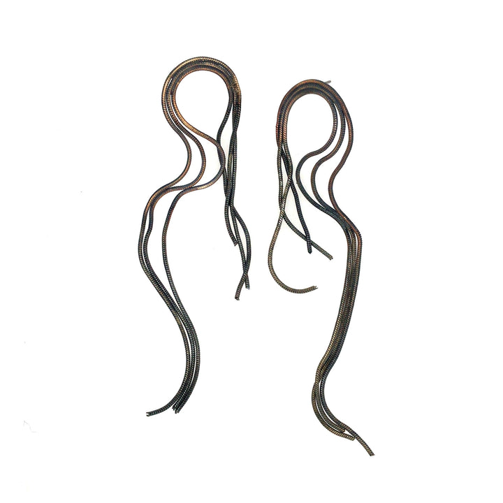 Earrings of repurposed snake chain, with steel posts.