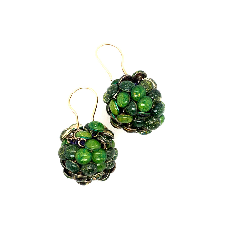 Round Green Resin Earrings. Droplets of green resin and sterling silver are woven together with purple thread.