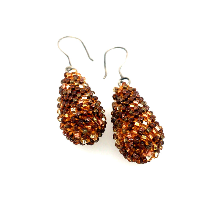 Golden Drop Earrings. Brown and clear glass beads are sewn in with golden yellow thread