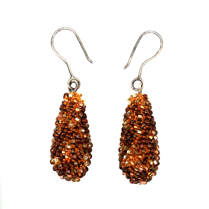 Golden Drop Earrings. Brown and clear glass beads are sewn in with golden yellow thread