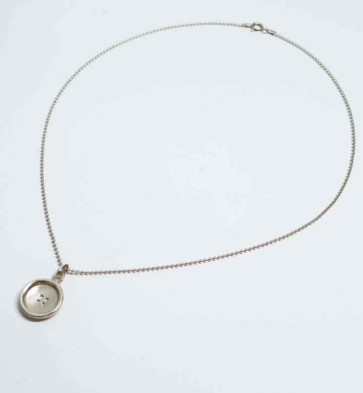 Button Pendant in Sterling Silver by MinSeo Whee