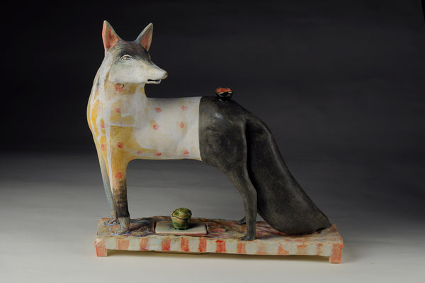 Raw Beauty - Ceramic sculpture of cone 6 stoneware finished with glazes and underglazes. The regal fox shields a small compartment in the base of this sculpture. 