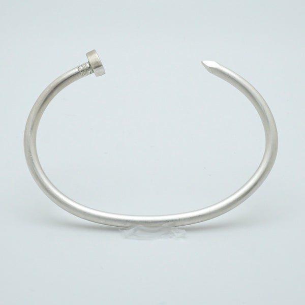 Silver Nail Bangle by Brooklyn Soucie