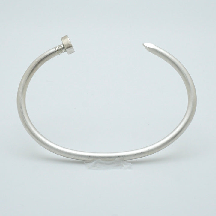 Silver Nail Bangle by Brooklyn Soucie