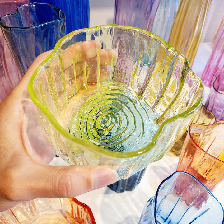 Holding Xylem Series hand blown glass dish