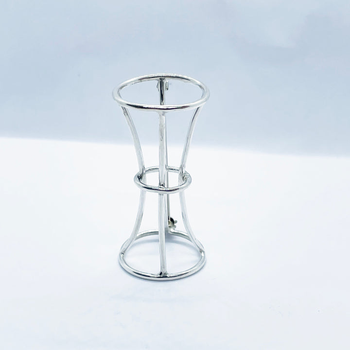 Bamboo report peace brooch, 2022.  Hand fabricated sterling silver brooch.  2.5 x 4.5 x 2.5 cm