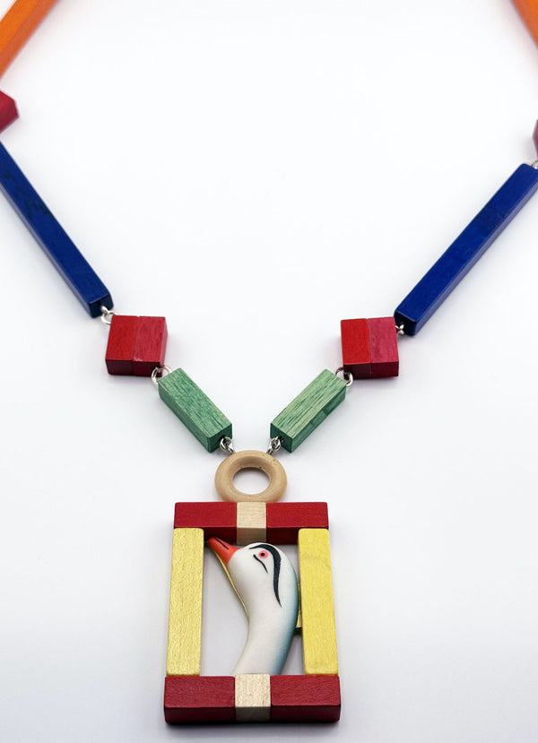 Colorful necklace with a bird pendant 