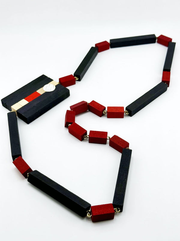 Necklace with black, red, and gold beads 