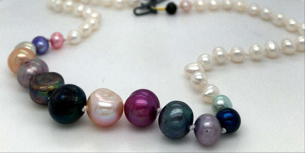 Colorful pearl necklace on a white background