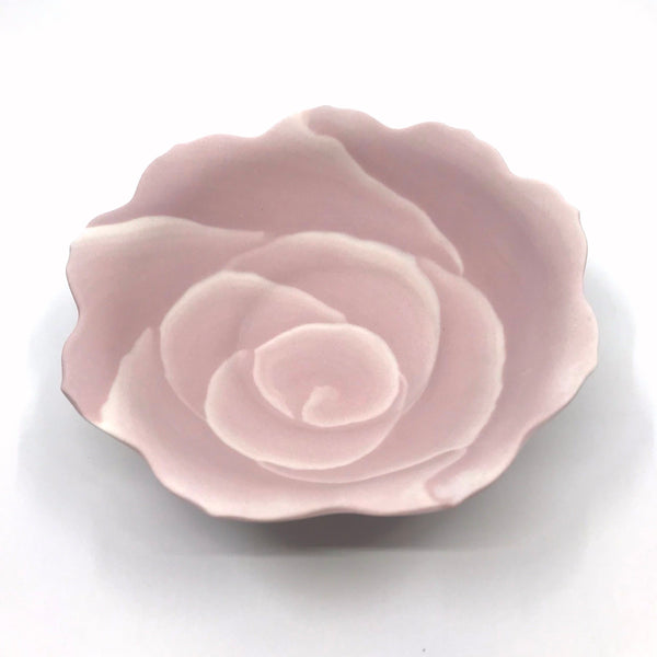 Small ceramic floral bowl with the hues of pink creating the form of a rose, made with the nerikomi ceramic technique. 