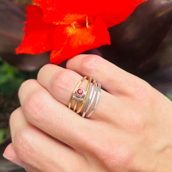 Twisting 18k Gold and Sterling Garnet Ring by Josee Desjardins