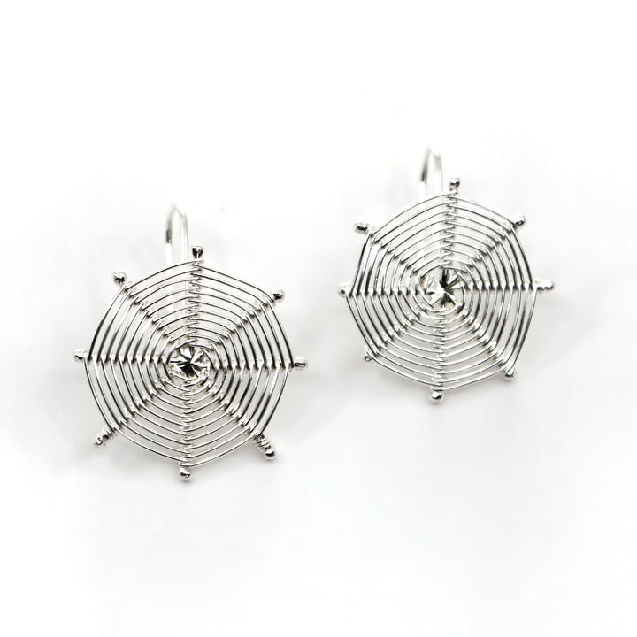 Hanging Webs earrings made from woven sterling silver.