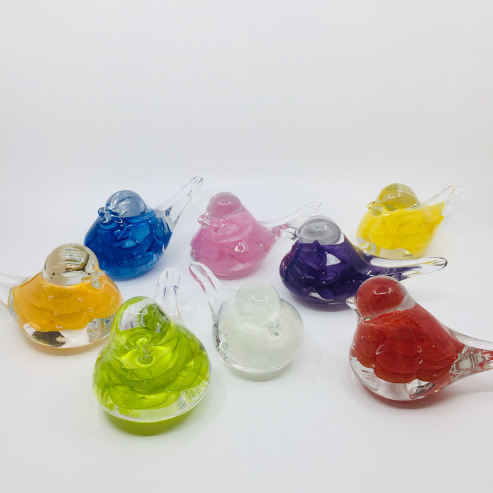 Hand formed glass birds in various colours, for a beautiful table ornament or paperweight. 