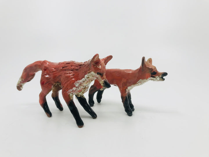 Small standing fox, ceramic sculpture. Approx. 5" long.