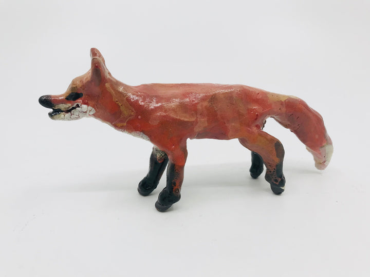 Small standing fox, ceramic sculpture. Approx. 5" long.
