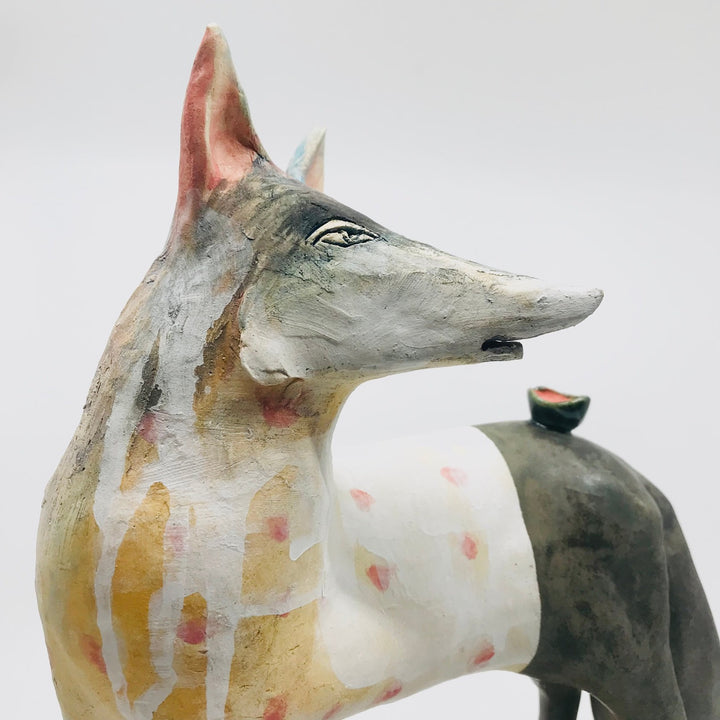 Raw Beauty - Ceramic sculpture of cone 6 stoneware finished with glazes and underglazes. The regal fox shields a small compartment in the base of this sculpture. 