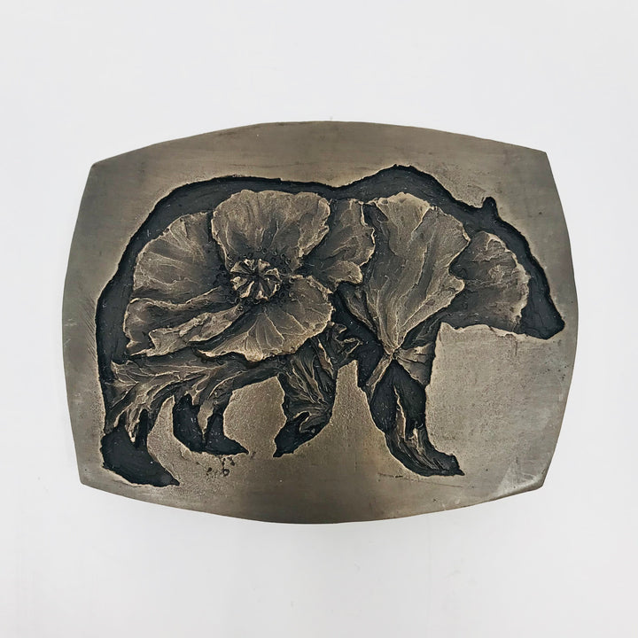 Poppy Bear is a cast bronze belt buckle. It comes with its own hand-crafted wooden storage box. 