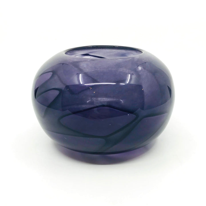 Shadow Vase Series: purple glass bowl with shards captured within the layers of the glass, 4" x 6". 