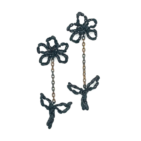 Leaf and flower stud earrings are transformed salvaged chains hand-fabricated into new forms, with a black powder coat. 7.5L x 2.3W cm.