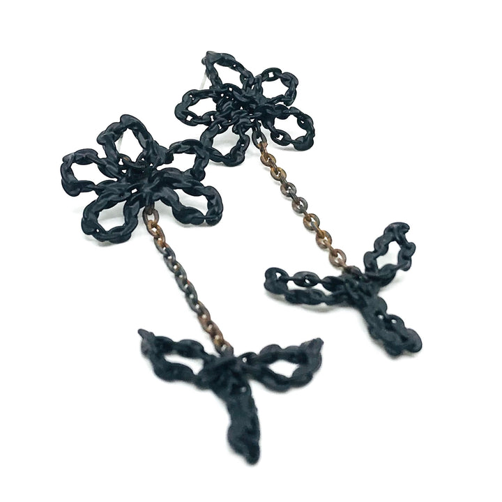 Leaf and flower stud earrings are transformed salvaged chains hand-fabricated into new forms, with a black powder coat. 7.5L x 2.3W cm.