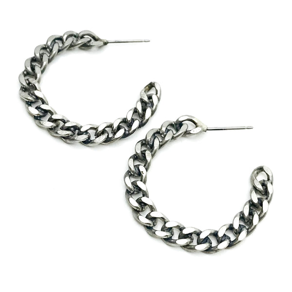 Matte oxidized stud earrings are transformed salvaged chains hand-fabricated into hoops. Steel posts. 3.3cm in diameter.