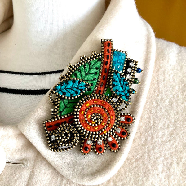 Orange Swirl Flower and Leaves Mixed Media Brooch by Odile Gova