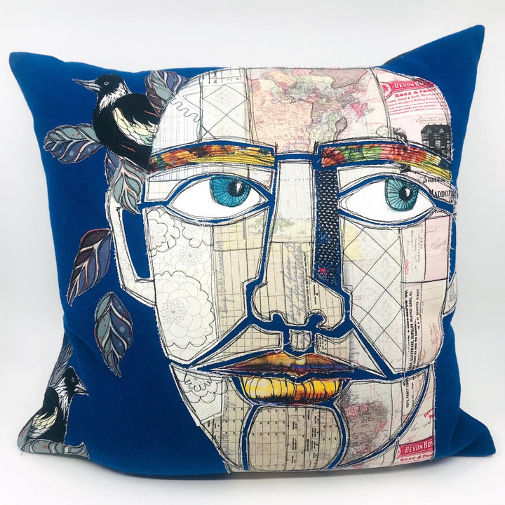 'Big Head' Pillow, 15"x15". Cotton applique on denim, with feather fill.