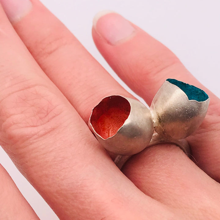Blue and red double-pod ring in sterling silver, size 7.25.