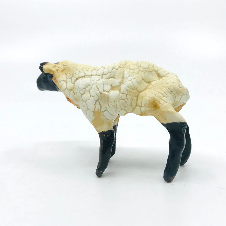 Small Sheep, ceramic sculpture, approx. 10l x 7h x 3 cm.