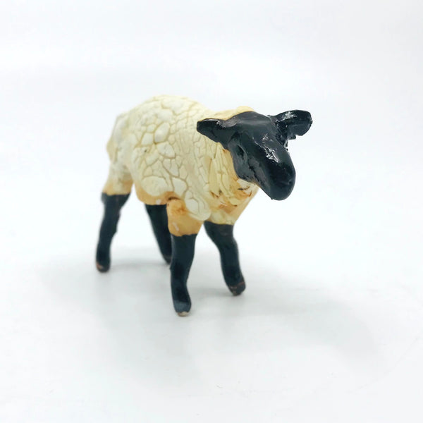 Small Sheep, ceramic sculpture, approx. 10l x 7h x 3 cm.