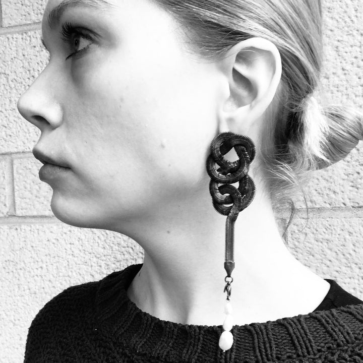 Large silver-plated snake chain knot earrings with baroque pearls, surgical steel posts and backs. 