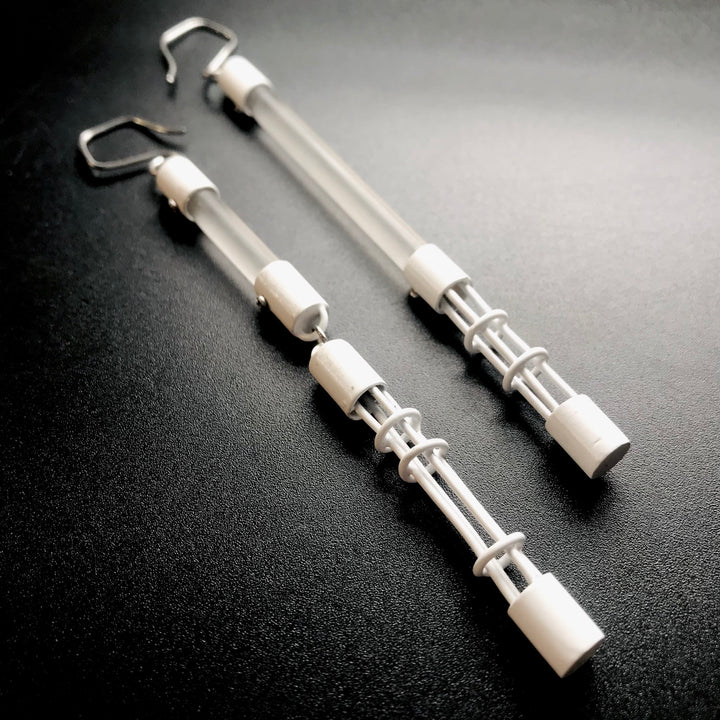 Acrylic Cage Rod hoop earrings in white, made from acrylic and recycled materials. 