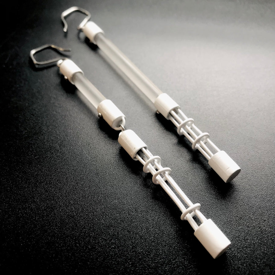 Acrylic Cage Rod hoop earrings in white, made from acrylic and recycled materials. 