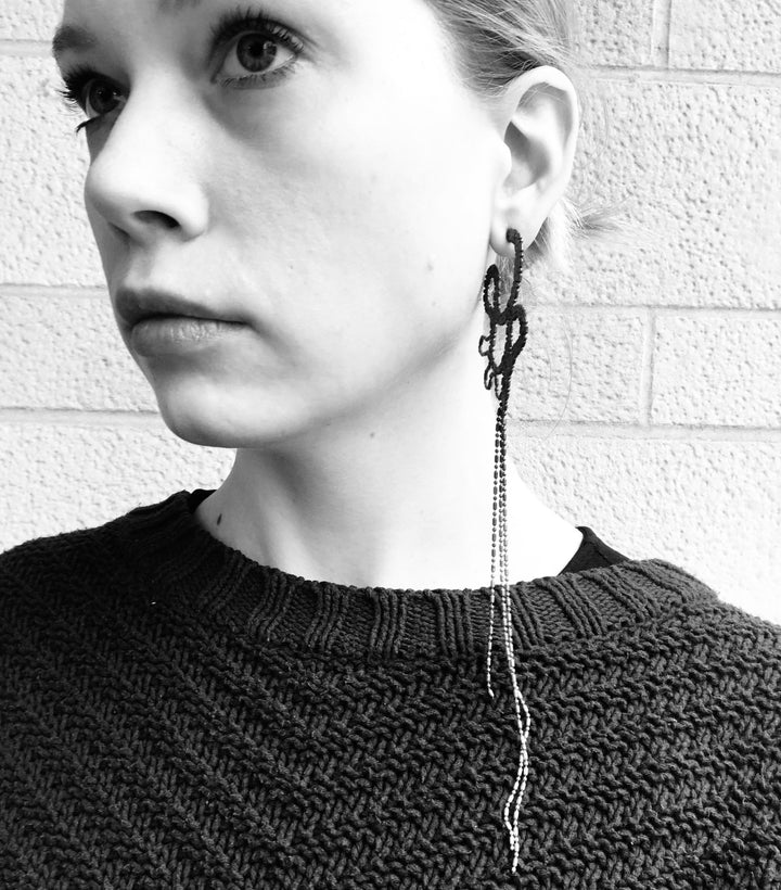 Large and light snake-like earrings of repurposed bamboo chain, with silver plating. 