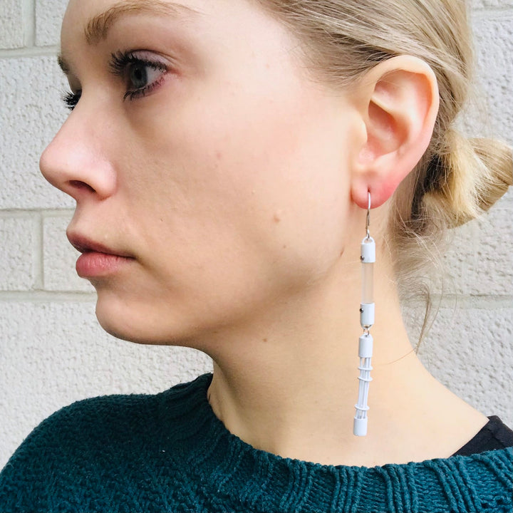 Acrylic Cage Rod hoop earrings in white, made from acrylic and recycled materials. 